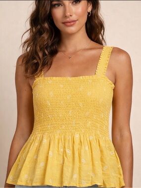 Cute Yellow top with stretch straps and elasticised bust line.  Size M.
NWOTS